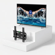 Τηλεόραση Strong SRT49UA6203 49" + Βάση Τοίχου Unitronic Σταθερή – Πακέτο — τηλεόραση και βάση τοίχου σε ανοιχτό γκρι φόντο