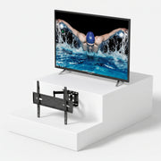 Τηλεόραση Strong SRT55UA6203 55" + Βάση Τοίχου Unitronic Full-Motion – Πακέτο — τηλεόραση και βάση τοίχου σε ανοιχτό γκρι φόντο